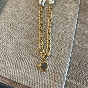 Elegant Gold and White Necklace